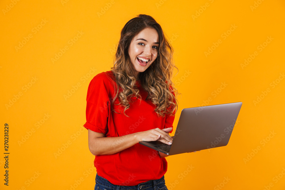 Portrait of a lovely cheerful young woman standing Portrait of a lovely cheerful young woman standing