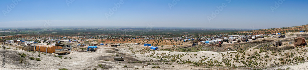 AZEZ, SYRIA – MAY 19: Refugee camp for syrian people in Burseya hill on May 19, 2019 in Azez, Syria. In the civil war that began in Syria on 2011, 12 million people were displaced.