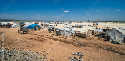 AZEZ, SYRIA – MAY 19: Refugee camp for syrian people in Burseya hill on May 19, 2019 in Azez, Syria. In the civil war that began in Syria in 2011, 12 million people were displaced. © hikrcn