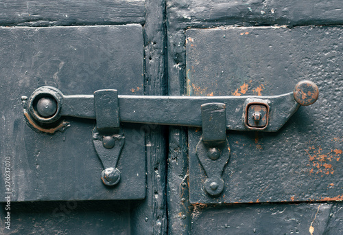old blue door metallic door latch © macondos