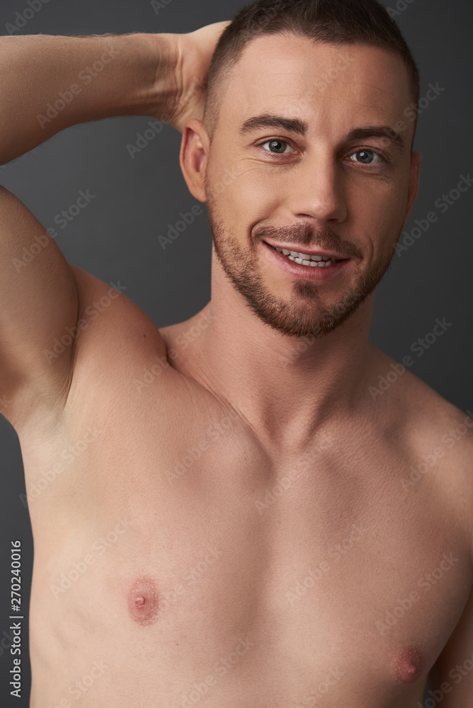 Close up portrait of muscle handsome bearded young man after having shower Close up portrait of muscle handsome bearded young man after having shower