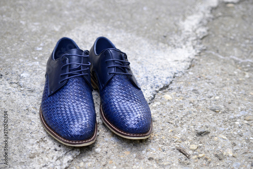 Men's fashion shoes blue, casual design on grass