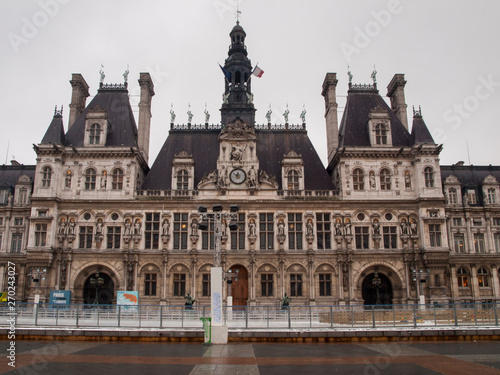 Paris, France, February 22, 2013: Paris City Hall (Hotel de Ville) taken in winter during a cloudy noon. The city hall hosts the Paris government .