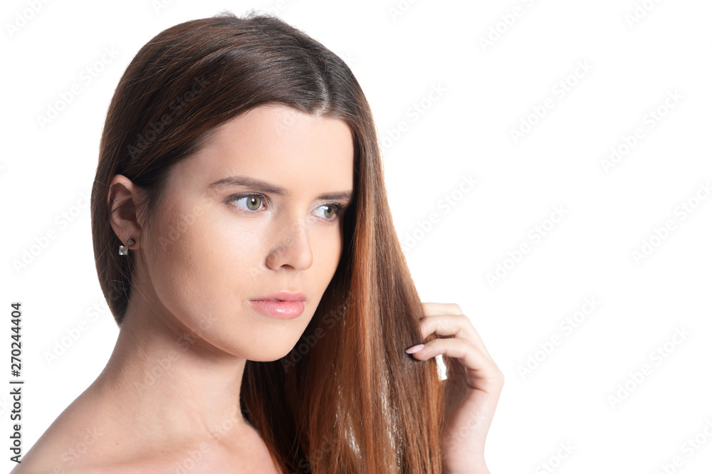 Close-up portrait of beautiful young woman isolated