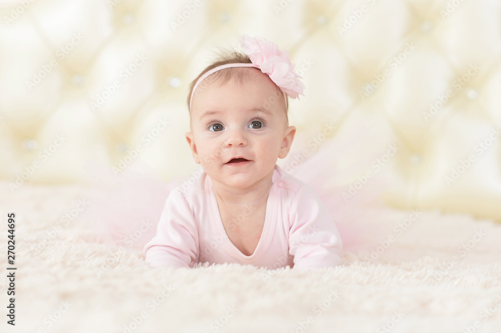 Portrait of cute charming girl in pink dress Portrait of cute charming girl in pink dress