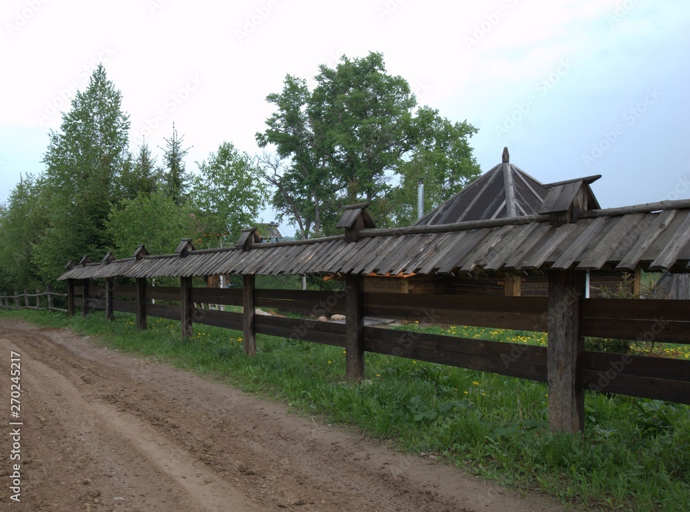 View of the wooden fence in the village View of the wooden fence in the village