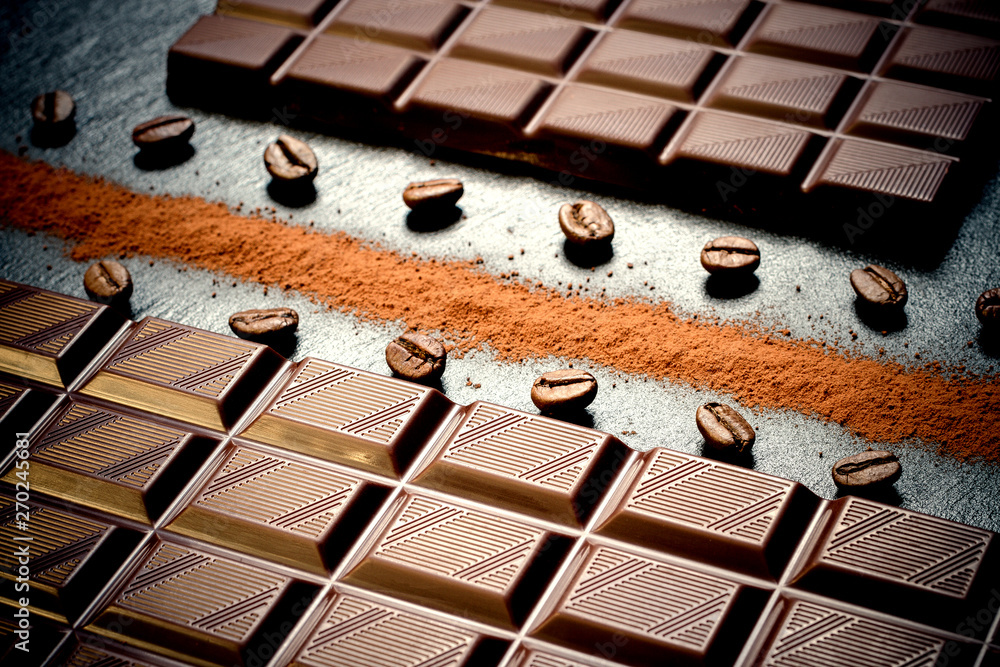 Naklejka premium Black chocolate bar, coffee beans, cocoa powder