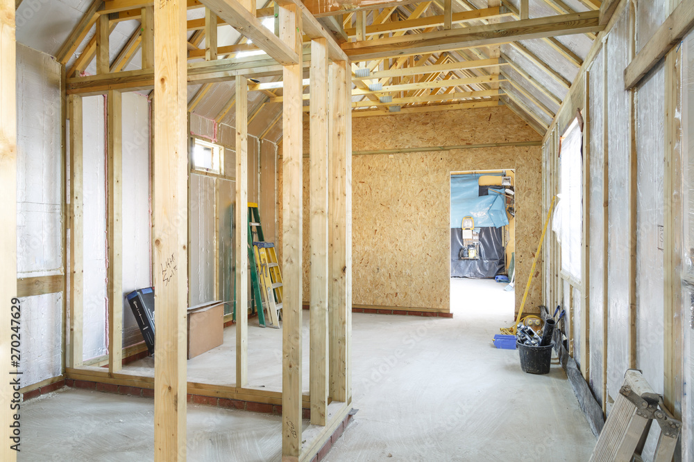 Timber frame house construction - obrazy, fototapety, plakaty 