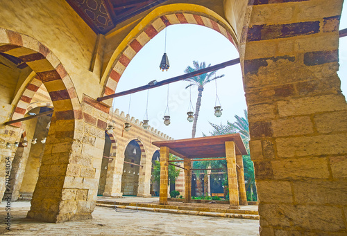In arcade of Aqsunqur (Blue) Mosque of Cairo, Egypt photo
