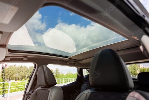 Panoramic sunroof in a car photo