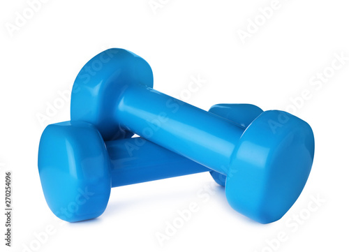 Color dumbbells on white background. Home fitness