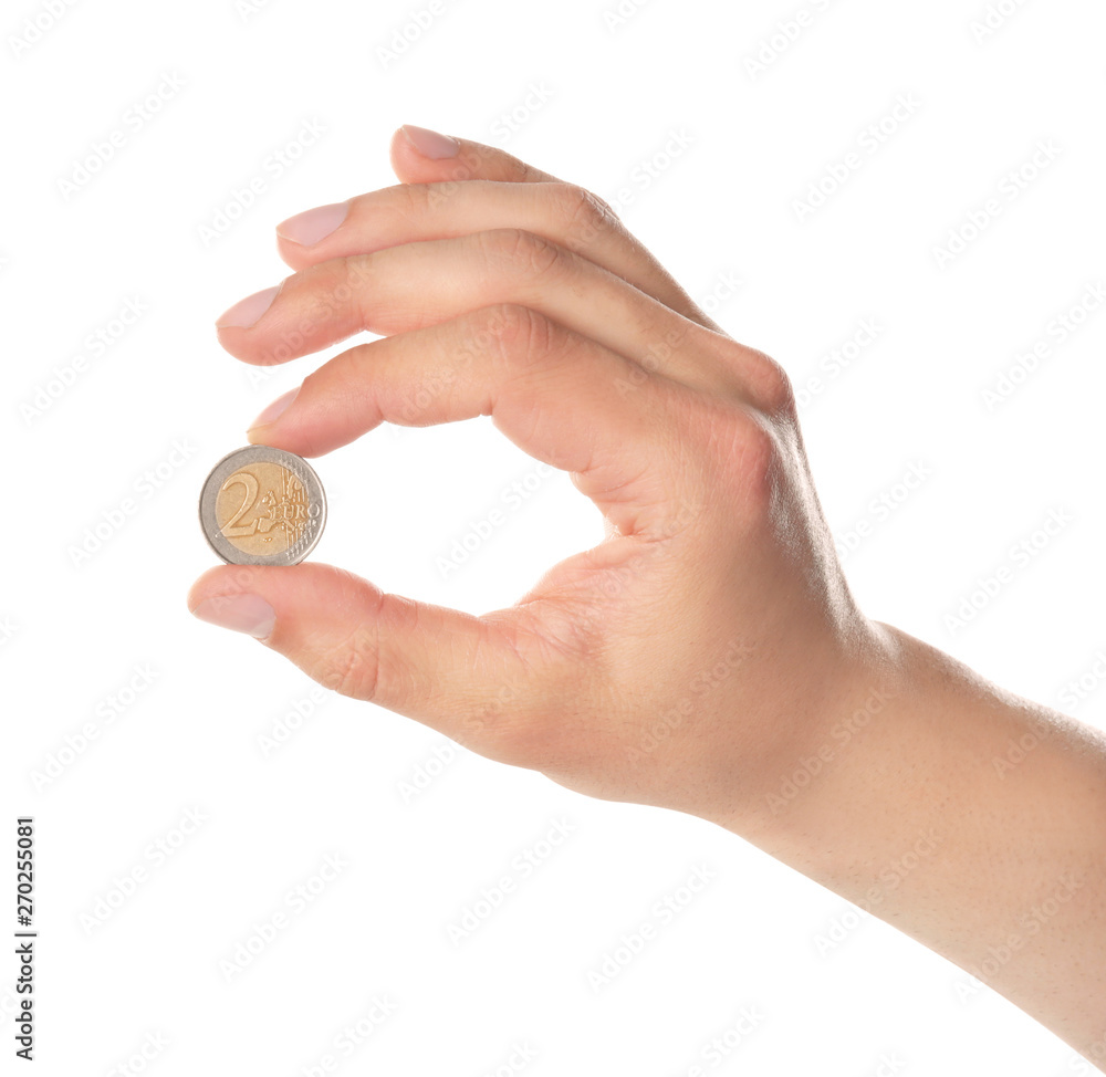 Man holding coin in hand on white background, closeup Man holding coin in hand on white background, closeup