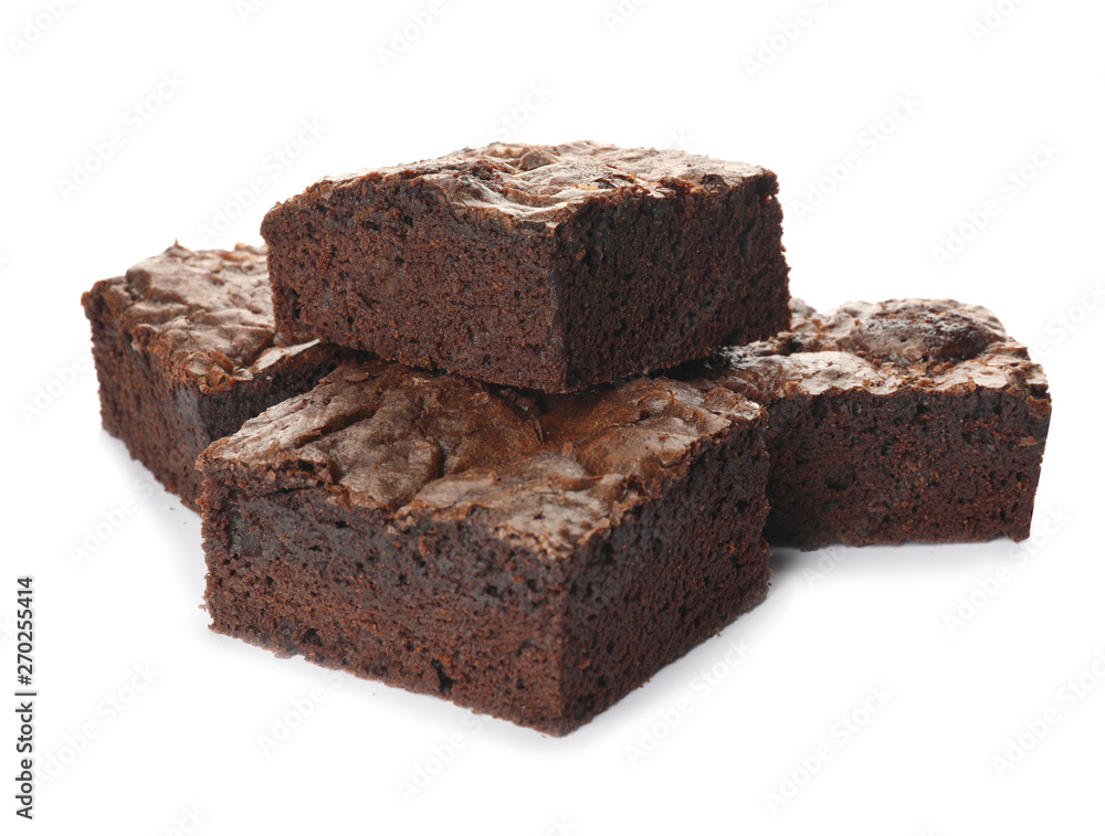 Pieces of fresh brownie on white background. Delicious chocolate pie Pieces of fresh brownie on white background. Delicious chocolate pie