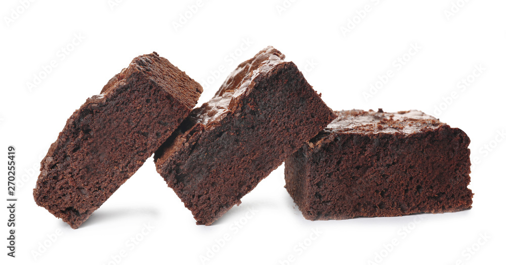 Pieces of fresh brownie on white background. Delicious chocolate pie Pieces of fresh brownie on white background. Delicious chocolate pie