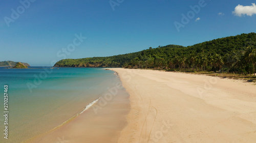 Wide sand beach Nacpan Beach  aerial view. El Nido  Palawan  Philippine Islands. Seascape with tropical beach and islands. Summer and travel vacation concept