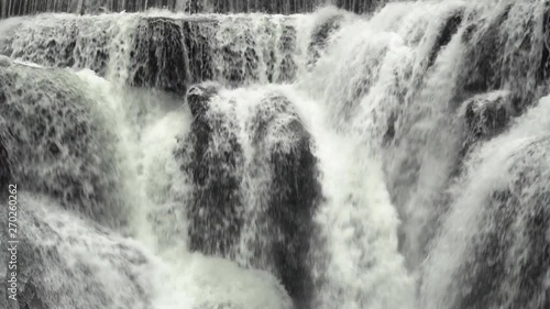 Shifen Waterfall Cascades, Pingxi, New Taipei, Taiwan. Close Up View photo