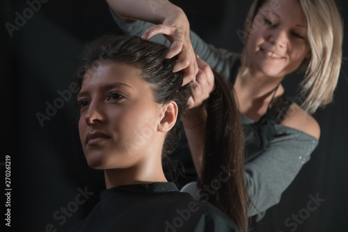Portrait of a beautiful woman at hair salon