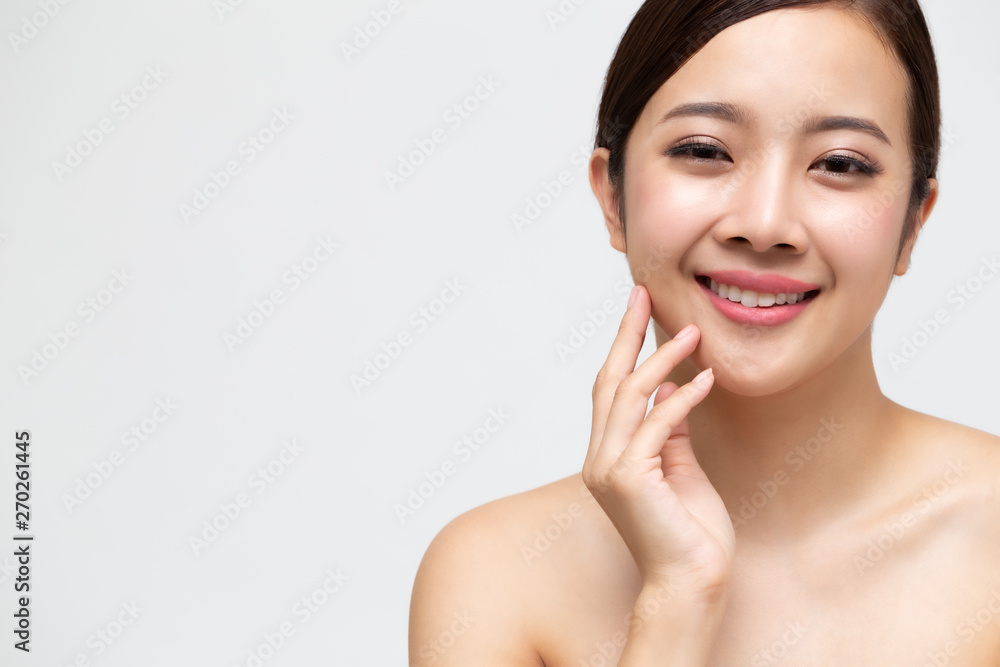 Happy beautiful young Asian woman with clean fresh skin, Girl beauty face care, Facial treatment and cosmetology spa concept Happy beautiful young Asian woman with clean fresh skin, Girl beauty face care, Facial treatment and cosmetology spa concept
