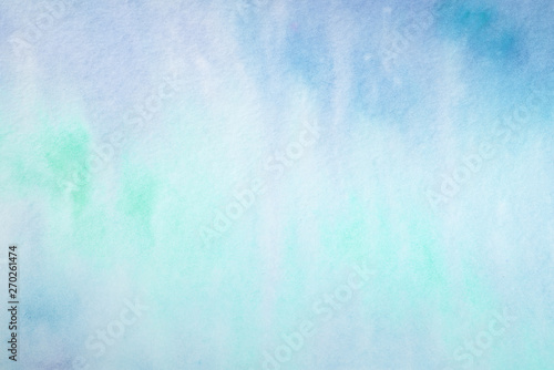watercolor background filled green aquamarine blue. on textured watercolor paper paint