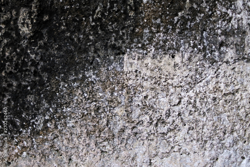 Obraz premium rough surface of the stone. rock formation. shade of gray