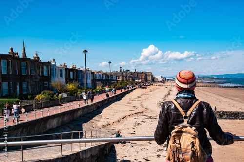 View of Portobello promenade with tourist. Edinburgh, Scotland, UK.