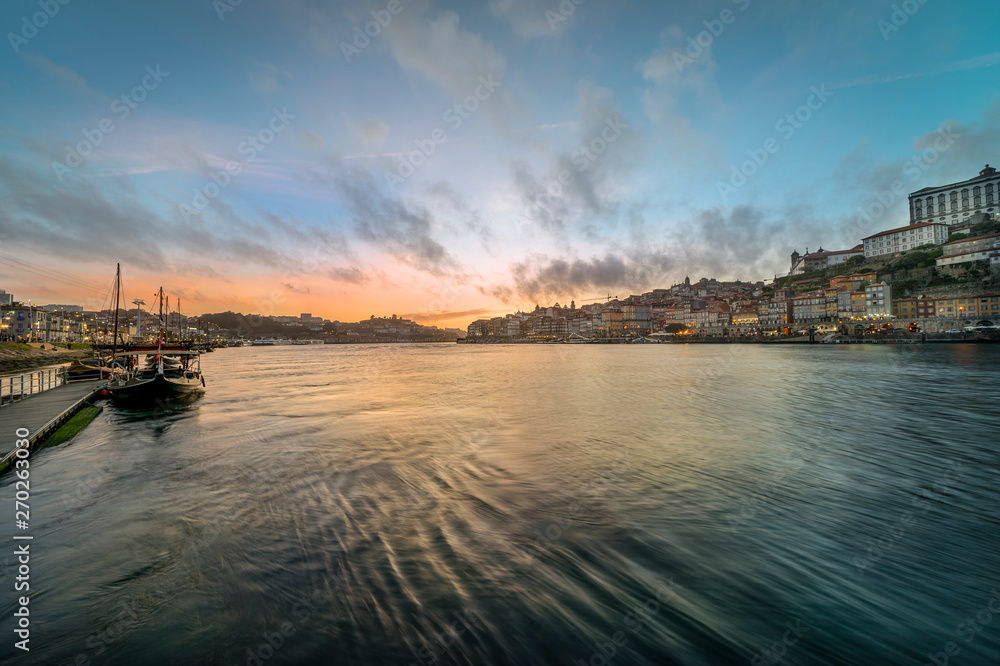 View along the Rio Douro and Porto at dusk.
