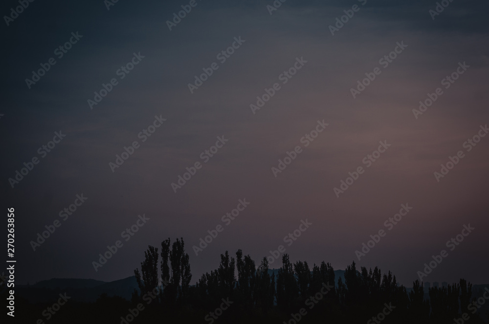 Landscape with dramatic light - beautiful golden sunset with saturated sky and clouds. Landscape with dramatic light - beautiful golden sunset with saturated sky and clouds.