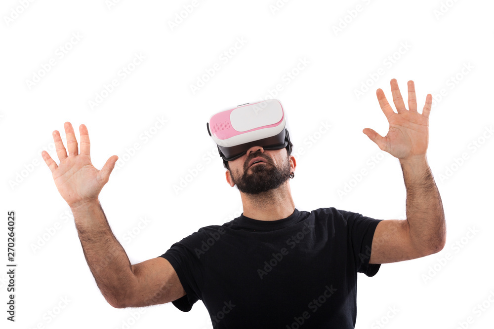 Bearded man use virtual reality glasses, goggles. Isolated. Guy in VR headset is looking at interactive screen. Playing mobile game app on device. Bearded man use virtual reality glasses, goggles. Isolated. Guy in VR headset is looking at interactive screen. Playing mobile game app on device.
