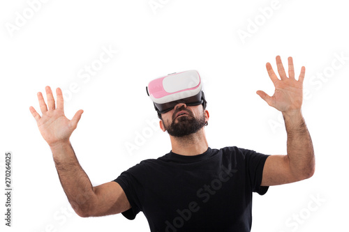 Bearded man use virtual reality glasses, goggles. Isolated. Guy in VR headset is looking at interactive screen. Playing mobile game app on device.