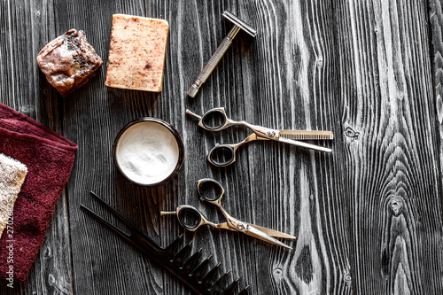 Tools for cutting beard barbershop top view on wooden background