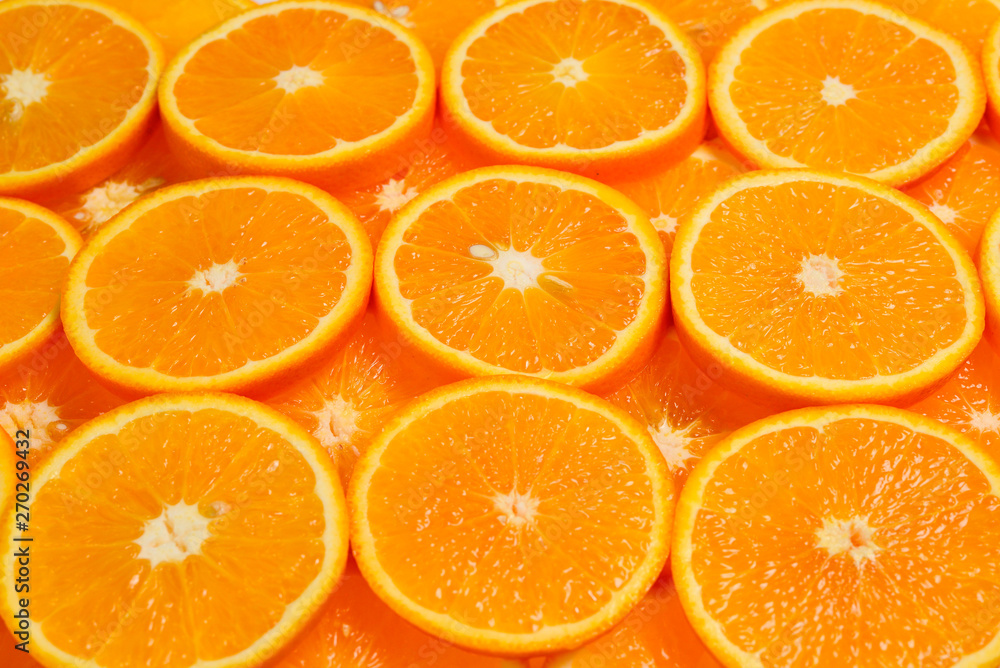 Slices of oranges as a background, top view. Slices of oranges as a background, top view.