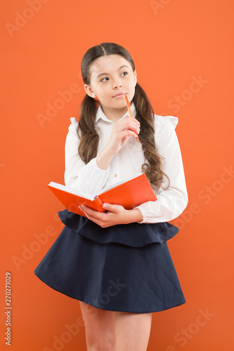 School lesson. Child doing homework. Your career path begins here. Inspiration for study. Back to school. Knowledge day. Possible everything. Schoolgirl enjoy study. Kid school uniform hold workbook