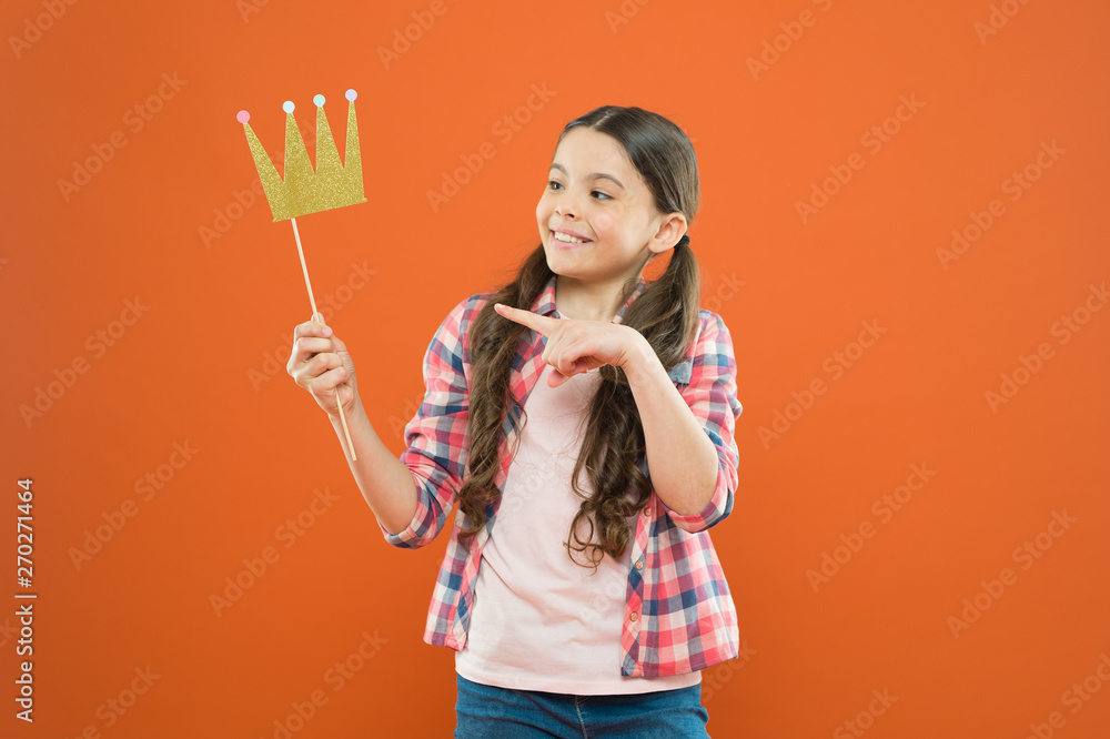 Happiness and joy concept. Fun and humor. Girl child having fun. International childrens day. Superior princess. Nice day to have fun with photo booth props. Playful mood. Golden crown suits her Happiness and joy concept. Fun and humor. Girl child having fun. International childrens day. Superior princess. Nice day to have fun with photo booth props. Playful mood. Golden crown suits her