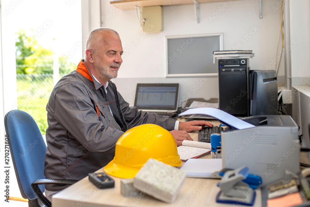 Control room operator at the ready mix concrete plant Control room operator at the ready mix concrete plant
