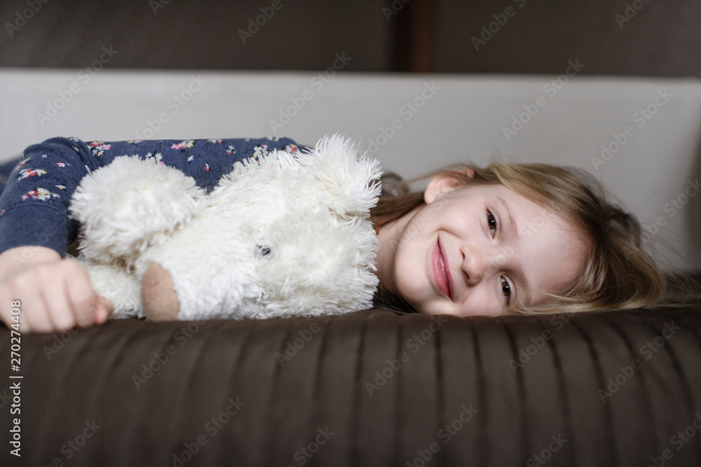 Portrait of happy little girl with white teddy bear Portrait of happy little girl with white teddy bear