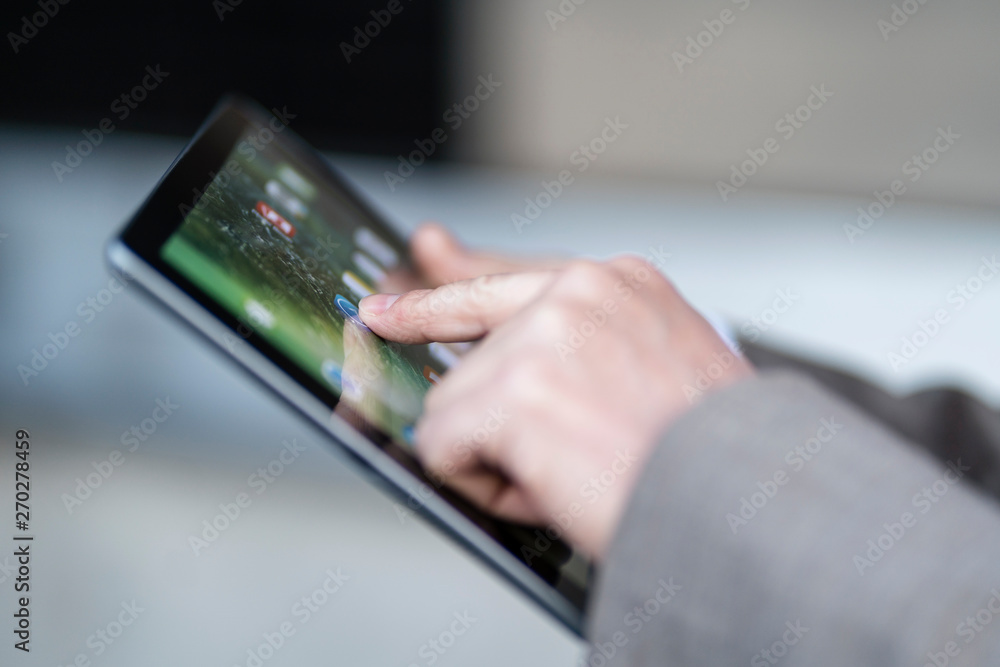 Close-up of businessman using tablet Close-up of businessman using tablet