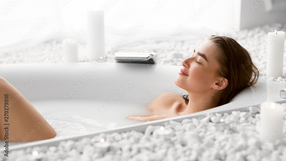 Wellness And Relax Concept. Woman Resting In Bath Wellness And Relax Concept. Woman Resting In Bath
