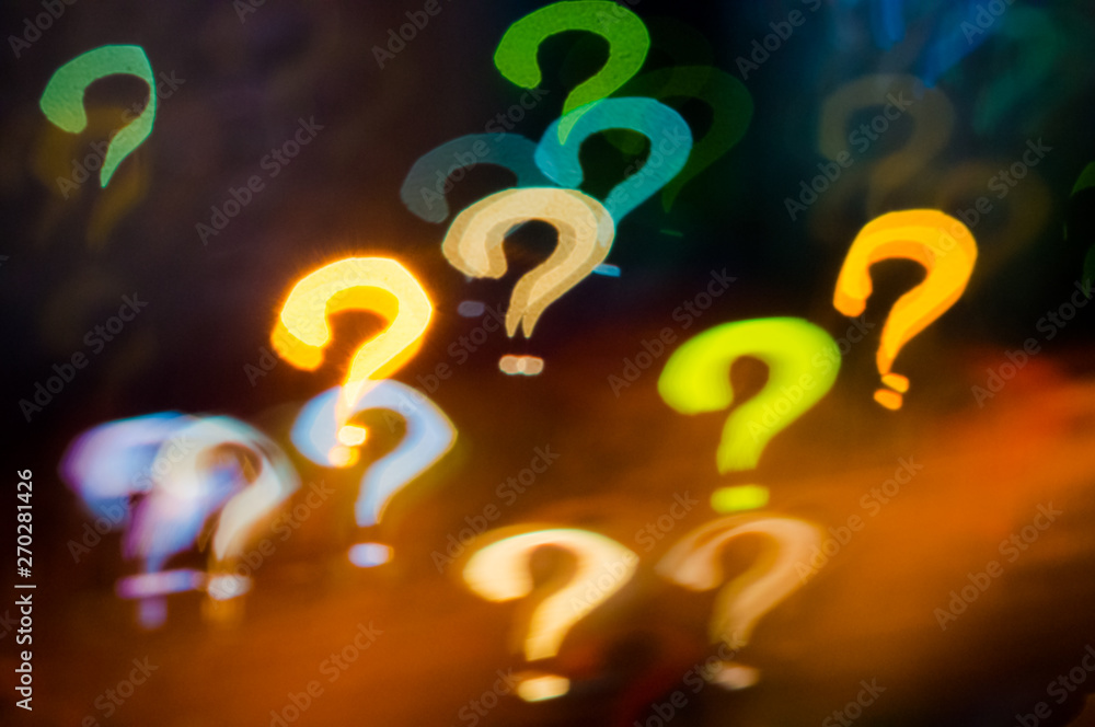 question mark Bokeh pattern on dark background question mark Bokeh pattern on dark background