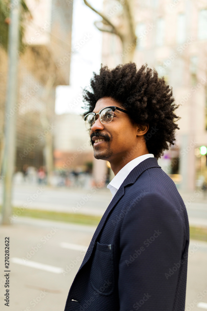 Spain, Barcelona, portrait of smiling businessman in the city Spain, Barcelona, portrait of smiling businessman in the city