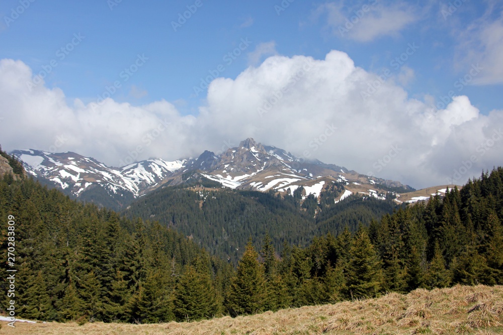 Mountains landscape in early spring - snow in the mountains 