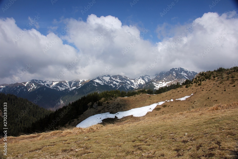Mountains landscape in early spring - snow in the mountains Mountains landscape in early spring - snow in the mountains