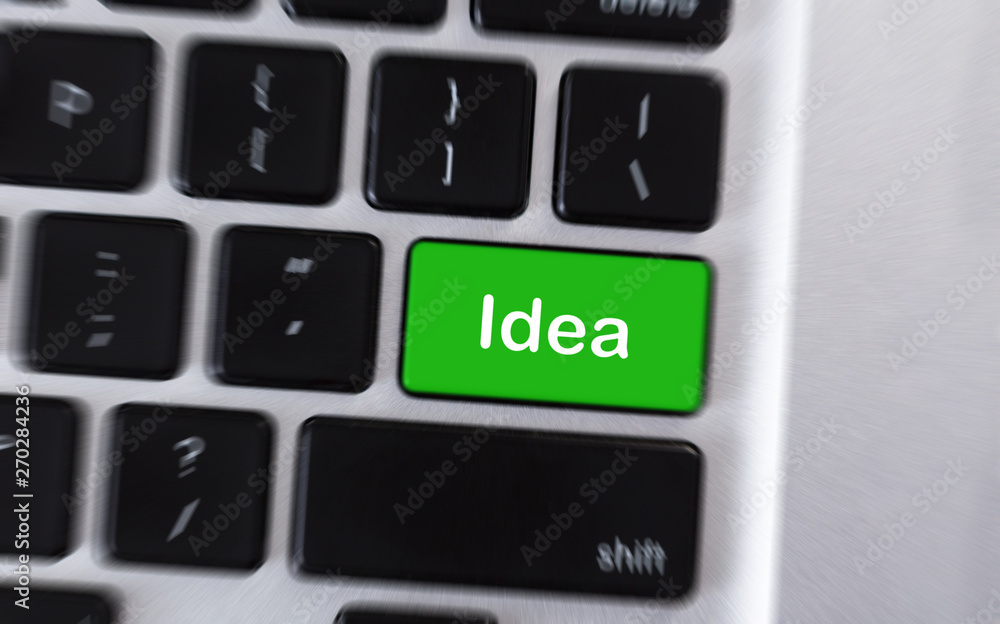 Text Idea on green button of computer keyboard Text Idea on green button of computer keyboard