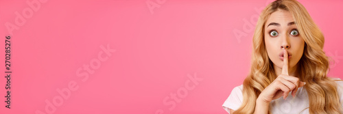 It's Secret! Girl Showing Silence Sign Holding Forefinger On Lips