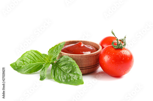 Fresh cherry tomatoes with basil and souce isolated on white background. Ripe vegetables