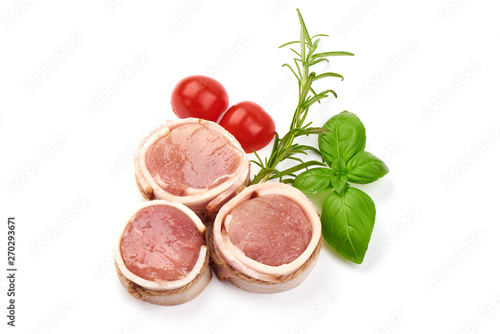 Fresh and juicy pork medallions wrapped in bacon, top view, isolated on white background Fresh and juicy pork medallions wrapped in bacon, top view, isolated on white background