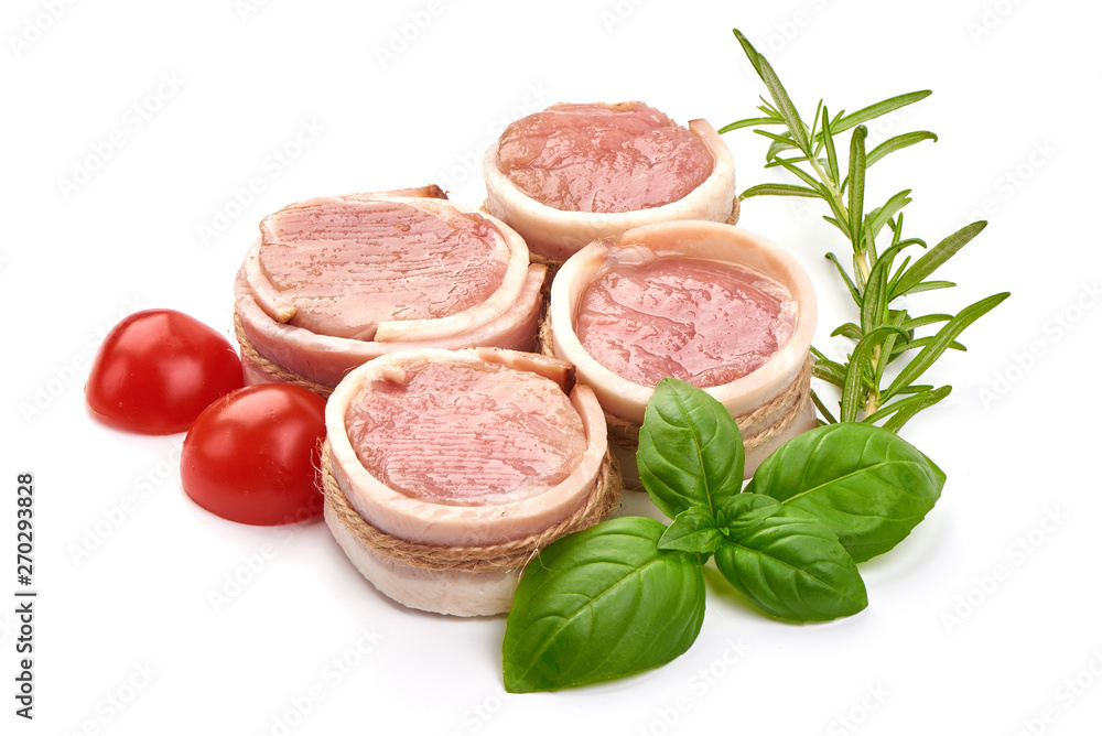 Fresh and juicy pork medallions wrapped in bacon, close-up, isolated on white background Fresh and juicy pork medallions wrapped in bacon, close-up, isolated on white background