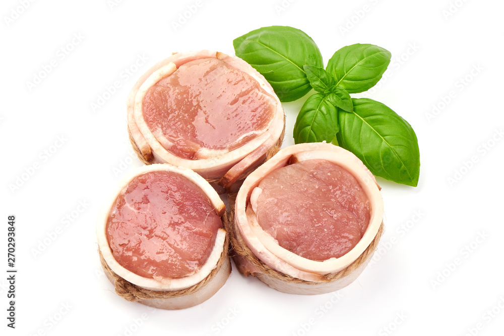 Raw meat fillet steaks wrapped in bacon, pork medallions, top view, isolated on white background