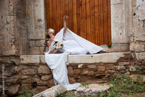 Dancers performing ancient Greek dances near the Acropolis of Athens. Greece, October 2019. 