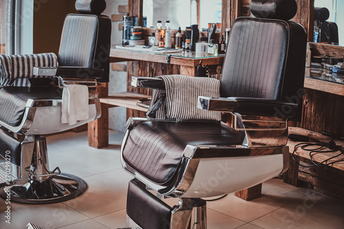Vintage interiour of luxury trandy barbershop in daylight. © Fxquadro