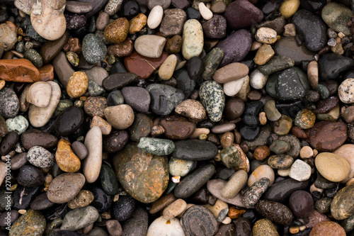 gravel on black ocean shore